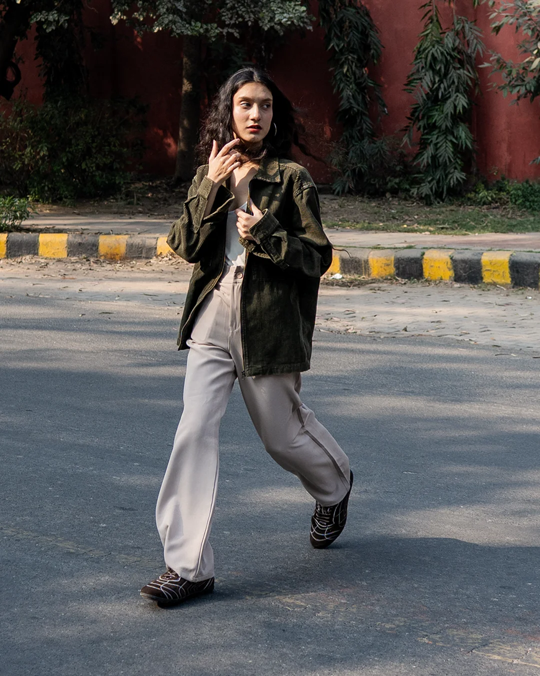 Editorial model wearing a Baiga collection pair, framing the women&rsquo;s collection.